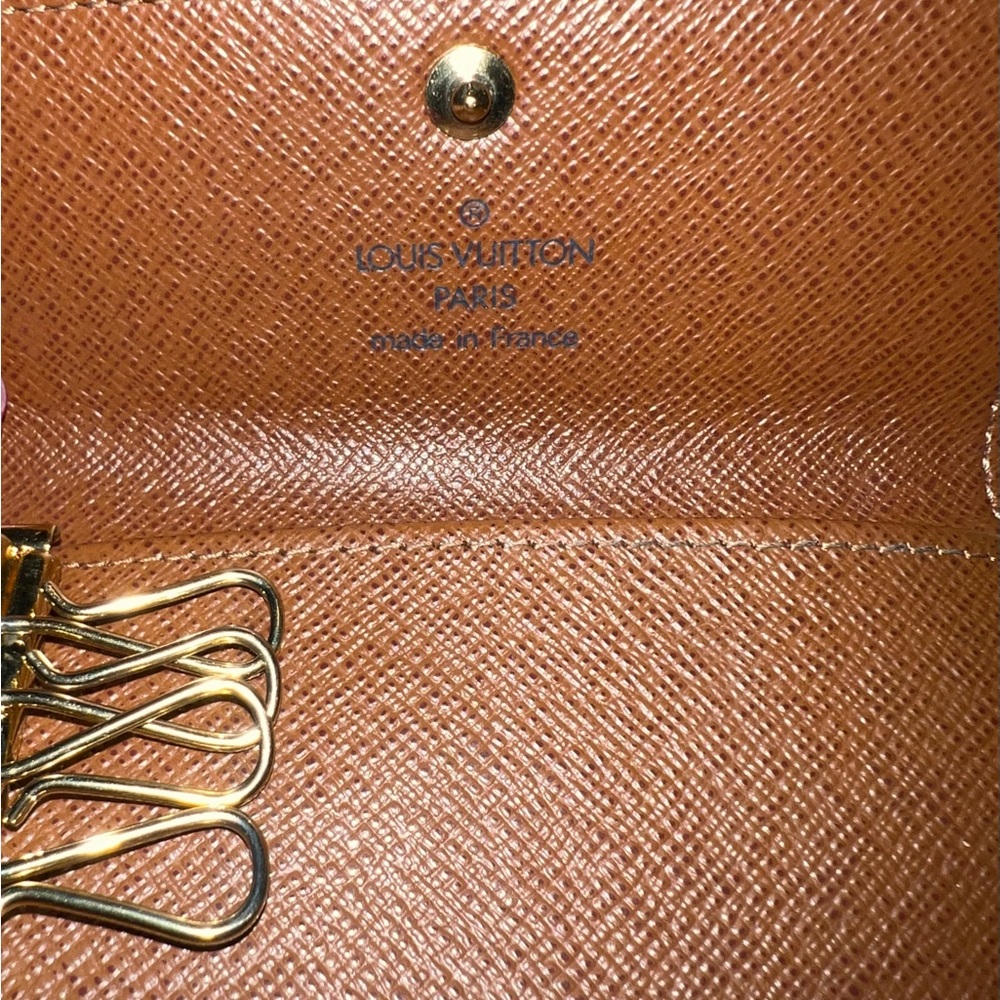 Authentic Louis Vuitton 4 key holder w/ authentication card. - Picture 8 of 10